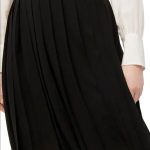 Black pleated midi skirt